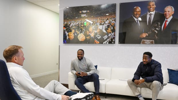 Coach Hugh Freeze, Coach Zac Etheridge and Coach Carnell Williams talk during the morning ofAuburn football signing day on Wednesday, Dec. 21, 2022 in Auburn, Ala. Todd Van Emst/AU Athletics
